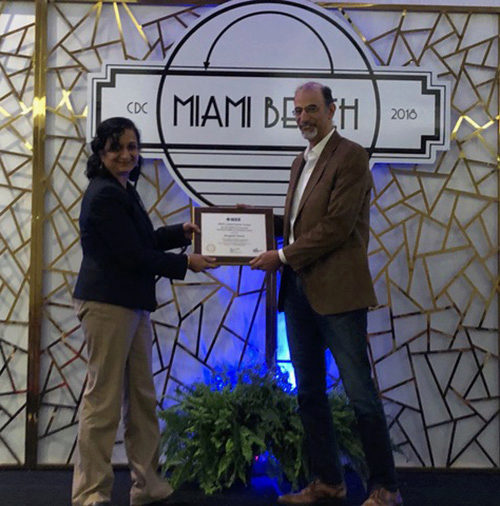 Panos Tsiotras receiving the CSS Award for Technical Excellence in Aerospace Control during the Miami, Florida IEEE conference